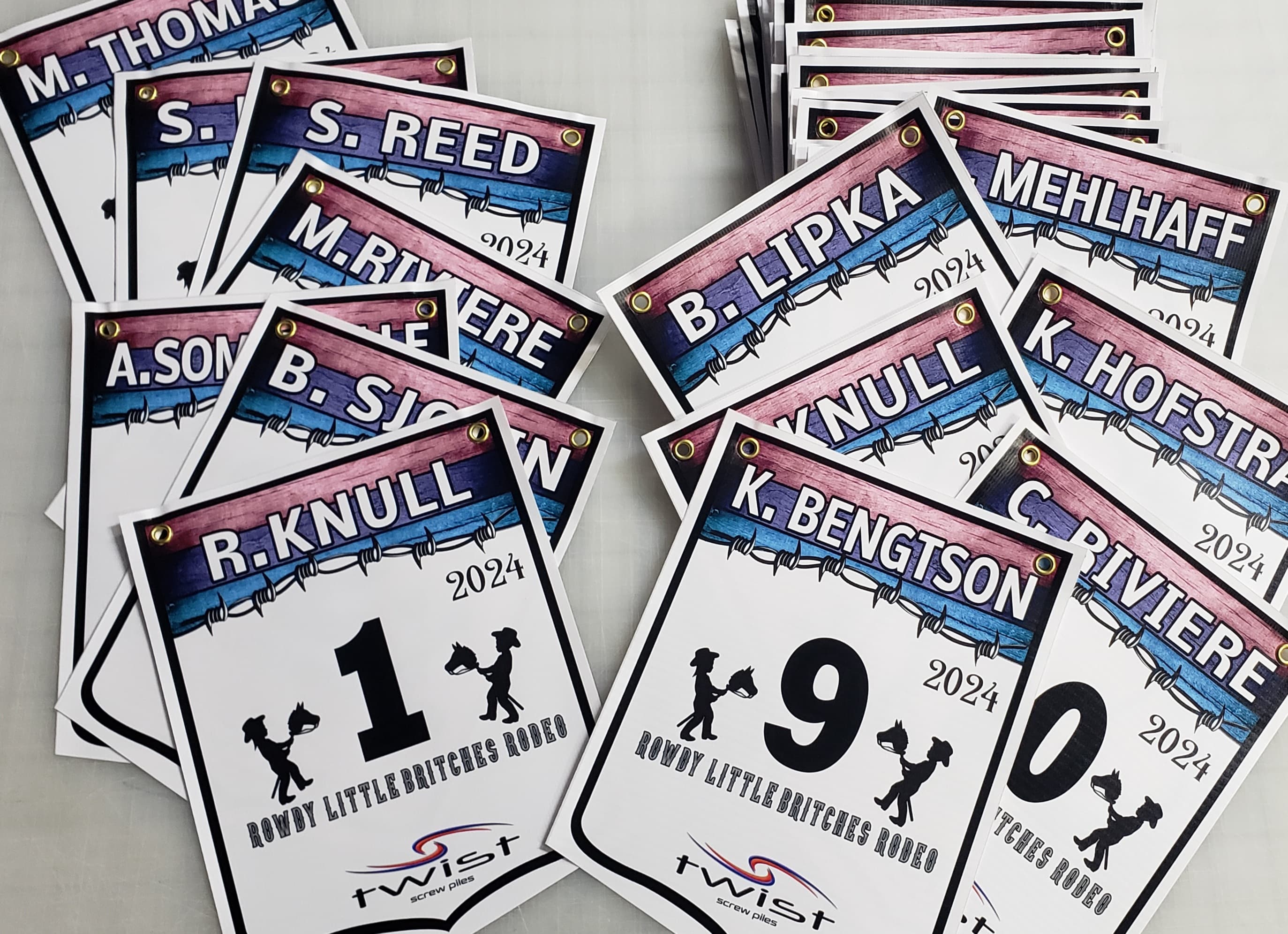 Named youth-rodeo back numbers with grommets